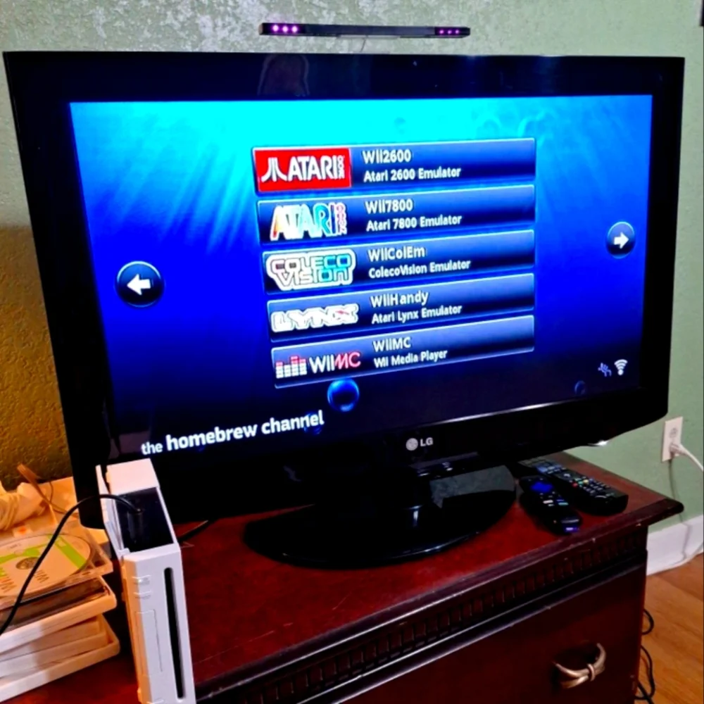 Nintendo Wii Console with White Console and Black TV Display